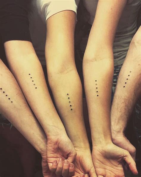 matching tattoo ideas for brothers|matching sibling tattoos for 3.